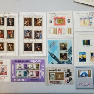 Lot E. Misc. Dubai, Uruguay, Panama, Umm Al Quwain, and more stamps