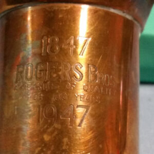 Rogers Bros Promotional Copper Measure of Quality for 100 Years, 1947