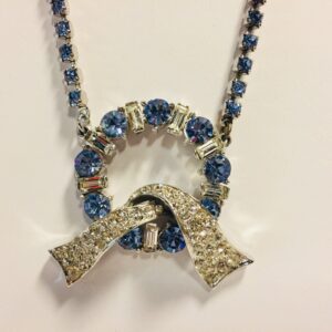 Vintage Corocraft Rhinestone Necklace Blue and Clear Rhinestone Wreath or Ribbon Design